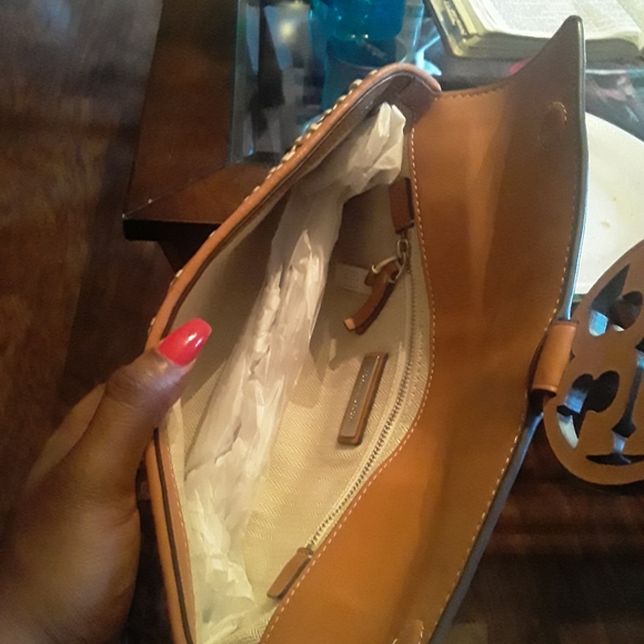 Tory burch clutch.  Brown leather. Only used a couple of times. - Picture 7 of 7